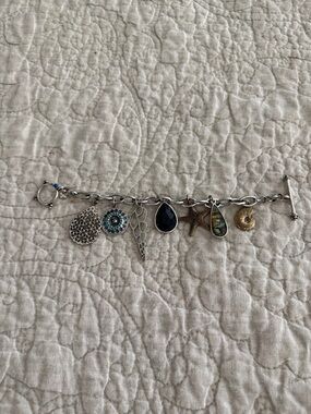 Lucky Brand Silver Charm Bracelet with Blue and Gold Accents